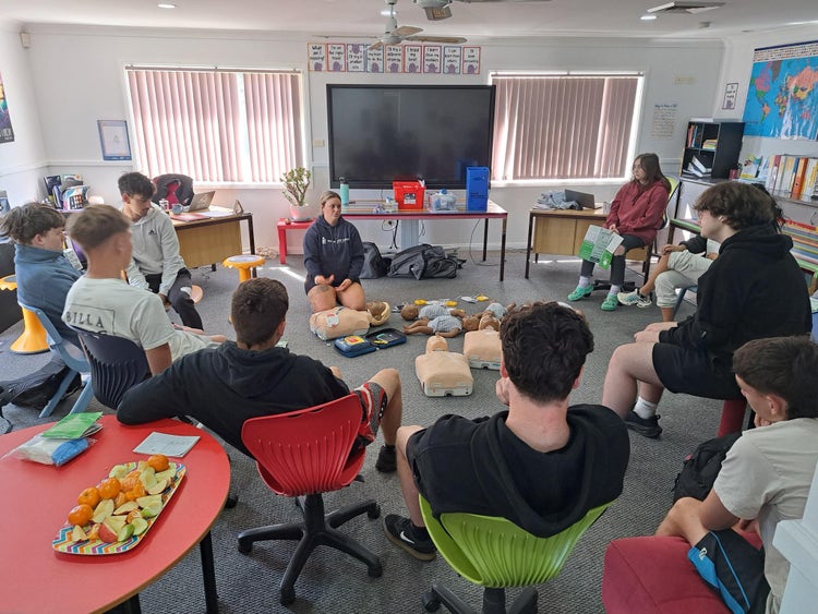 May be an image of studying